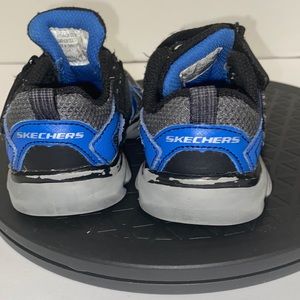 Toddler Skechers size 5 with minor flaws shown in pictures.
